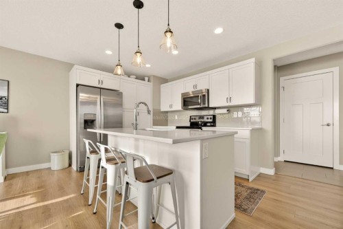 148 Cabot Landing West, Lethbridge, AB - Indoor Photo Showing Kitchen With Stainless Steel Kitchen With Upgraded Kitchen