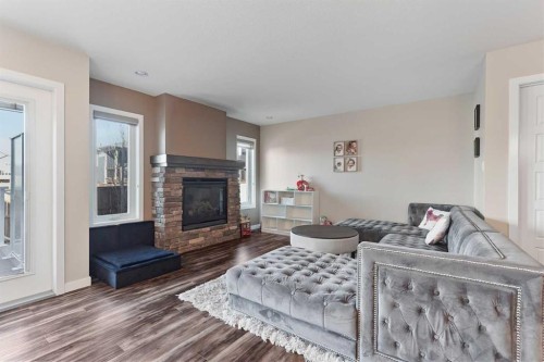 493 Devonia Way West, Lethbridge, AB - Indoor Photo Showing Living Room With Fireplace