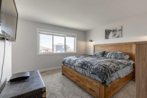1366 Pacific Circle West, Lethbridge, AB - Indoor Photo Showing Bedroom