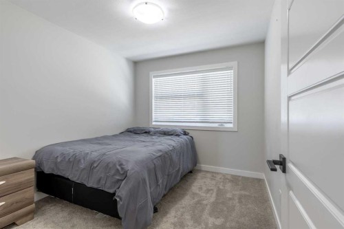 1366 Pacific Circle West, Lethbridge, AB - Indoor Photo Showing Bedroom