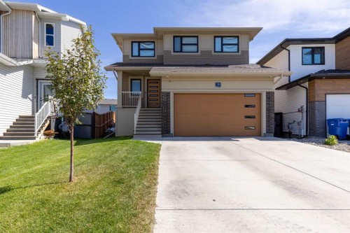1366 Pacific Circle West, Lethbridge, AB - Outdoor With Facade
