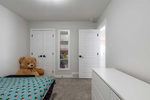1366 Pacific Circle West, Lethbridge, AB - Indoor Photo Showing Bedroom