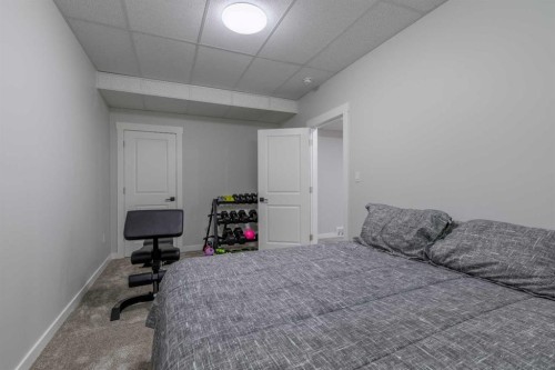 1366 Pacific Circle West, Lethbridge, AB - Indoor Photo Showing Bedroom