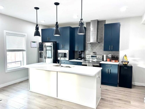 1366 Pacific Circle West, Lethbridge, AB - Indoor Photo Showing Kitchen With Double Sink With Upgraded Kitchen