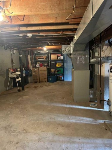 5108 57 Street, Taber, AB - Indoor Photo Showing Basement