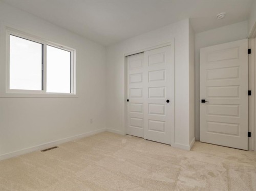 150 Caribou Bend North, Lethbridge, AB - Indoor Photo Showing Other Room