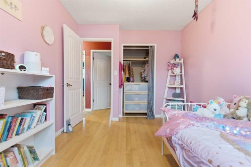 76 Brookpark Place Sw, Calgary, AB - Indoor Photo Showing Bedroom