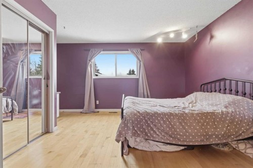 76 Brookpark Place Sw, Calgary, AB - Indoor Photo Showing Bedroom