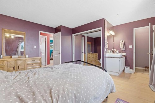 76 Brookpark Place Sw, Calgary, AB - Indoor Photo Showing Bedroom