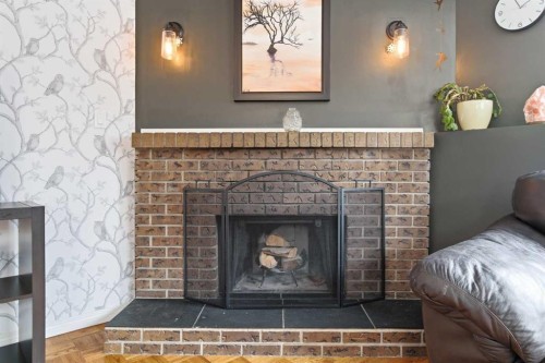 76 Brookpark Place Sw, Calgary, AB - Indoor Photo Showing Living Room With Fireplace