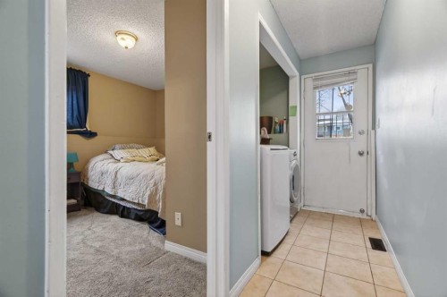 76 Brookpark Place Sw, Calgary, AB - Indoor Photo Showing Laundry Room