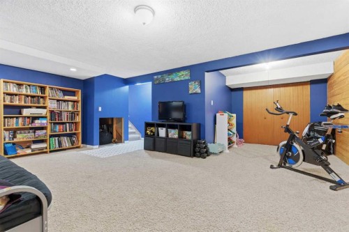 76 Brookpark Place Sw, Calgary, AB - Indoor Photo Showing Gym Room