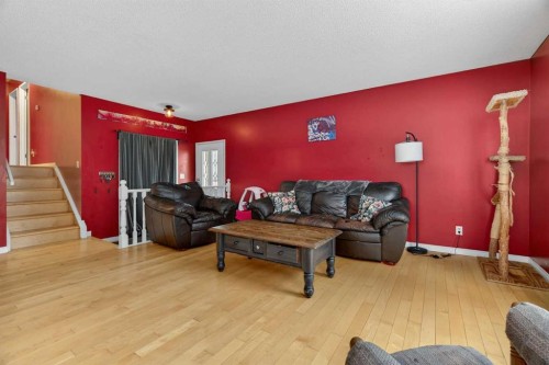 76 Brookpark Place Sw, Calgary, AB - Indoor Photo Showing Living Room