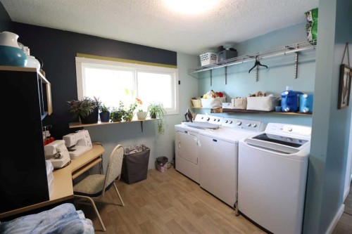 115054 Rr 103, Bow Island, AB - Indoor Photo Showing Laundry Room