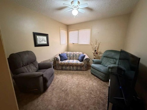 5120 48 Street, Taber, AB - Indoor Photo Showing Living Room