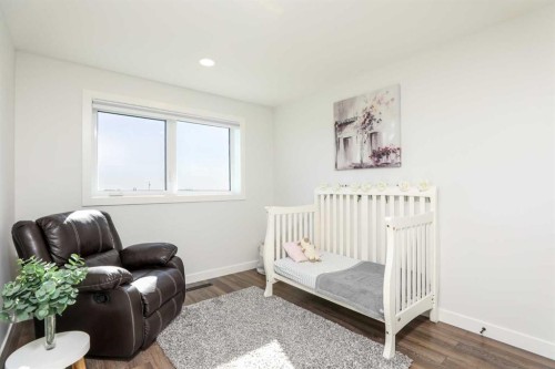 223001 Twp 9-2, Coalhurst, AB - Indoor Photo Showing Bedroom