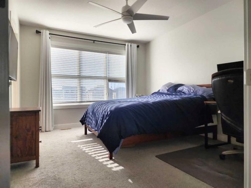 2-69 Aquitania Circle West, Lethbridge, AB - Indoor Photo Showing Bedroom