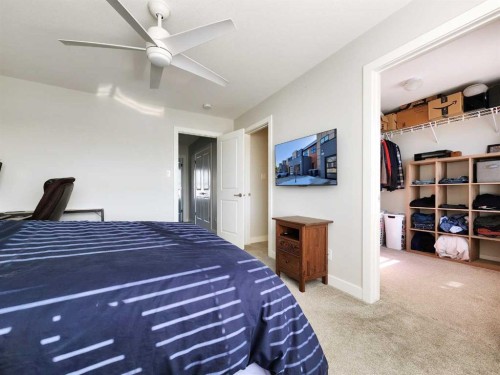 2-69 Aquitania Circle West, Lethbridge, AB - Indoor Photo Showing Bedroom