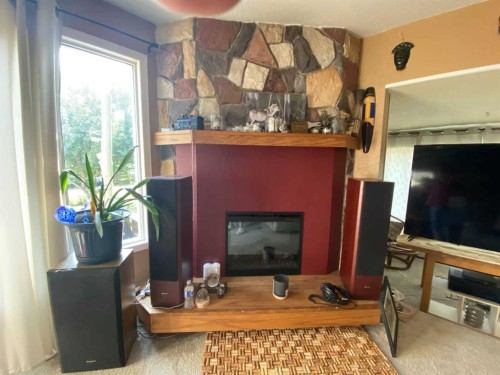 6001 16 Avenue, Coleman, AB - Indoor With Fireplace
