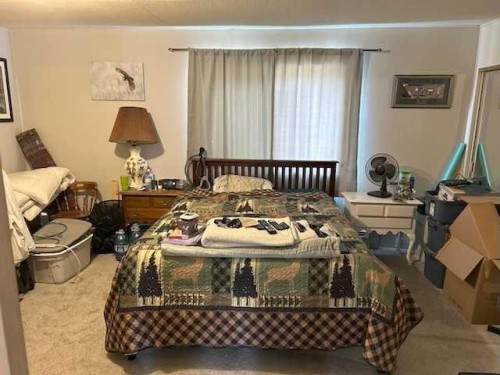 6001 16 Avenue, Coleman, AB - Indoor Photo Showing Bedroom