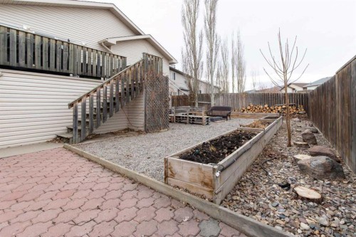 73 Heritage Circle West, Lethbridge, AB - Outdoor With Exterior