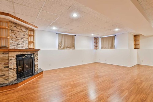 1012 24 Avenue, Coaldale, AB - Indoor With Fireplace
