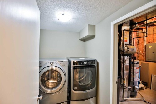 92 Heritage Circle West, Lethbridge, AB - Indoor Photo Showing Laundry Room