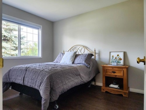 41 Westlynn Drive West, Claresholm, AB - Indoor Photo Showing Bedroom