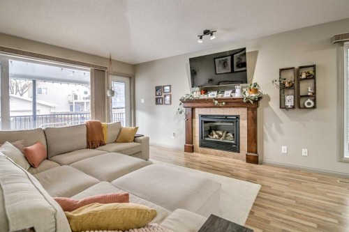 78 Coalbanks Gate West, Lethbridge, AB - Indoor Photo Showing Living Room With Fireplace