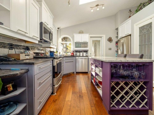 22 Riverstone Boulevard West, Lethbridge, AB - Indoor Photo Showing Kitchen With Upgraded Kitchen