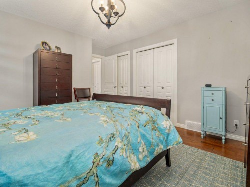 22 Riverstone Boulevard West, Lethbridge, AB - Indoor Photo Showing Bedroom