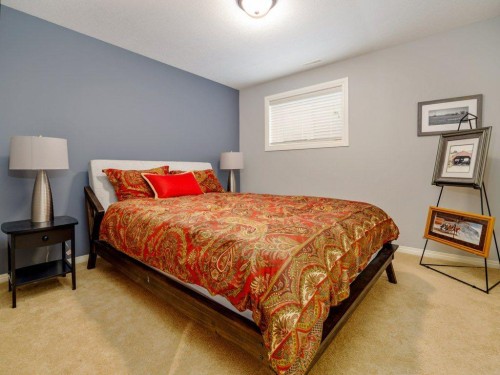 22 Riverstone Boulevard West, Lethbridge, AB - Indoor Photo Showing Bedroom
