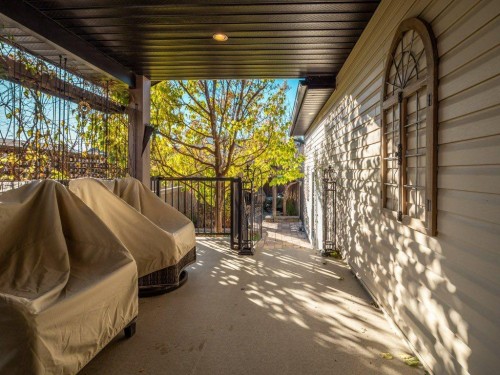 22 Riverstone Boulevard West, Lethbridge, AB - Outdoor With Deck Patio Veranda With Exterior