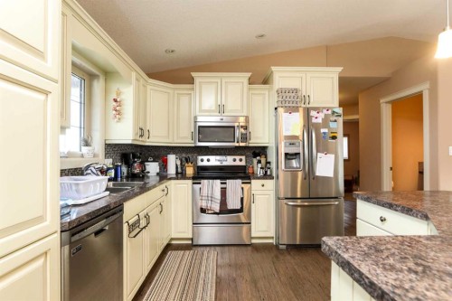 5103 62 Avenue, Taber, AB - Indoor Photo Showing Kitchen With Double Sink