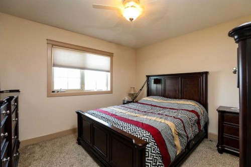 5103 62 Avenue, Taber, AB - Indoor Photo Showing Bedroom