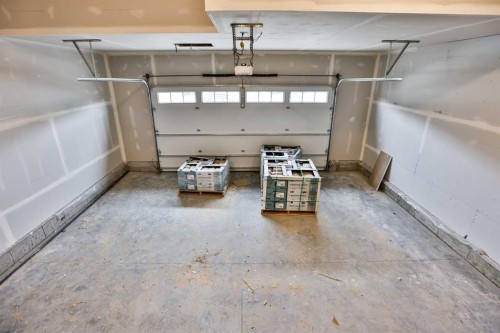 668 Devonia Road West, Lethbridge, AB - Indoor Photo Showing Garage