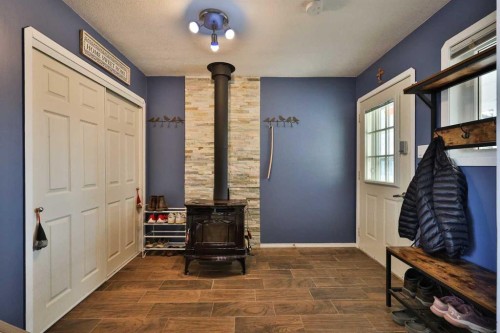 405 5 Avenue, Warner, AB - Indoor Photo Showing Other Room With Fireplace