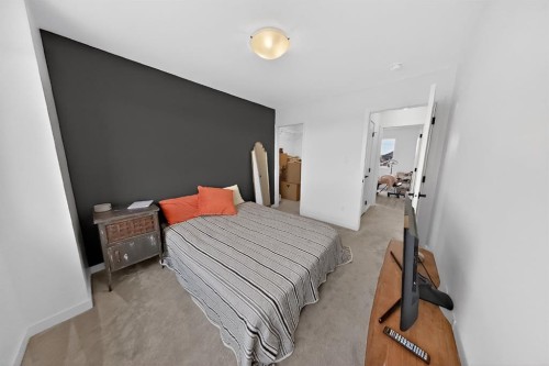 302 Uplands Boulevard North, Lethbridge, AB - Indoor Photo Showing Bedroom