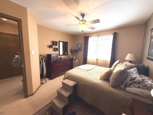 493 Squamish Lane West, Lethbridge, AB - Indoor Photo Showing Bedroom
