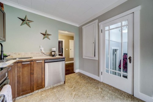 8301 18 Avenue, Coleman, AB - Indoor Photo Showing Kitchen With Double Sink