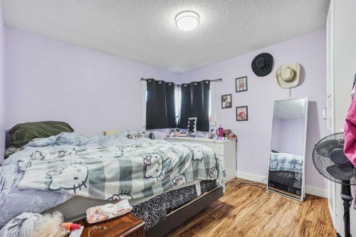 305 2 Avenue West, Cardston, AB - Indoor Photo Showing Bedroom