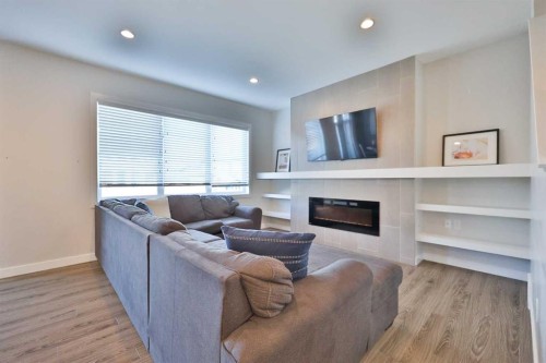 283 Northlander Bend West, Lethbridge, AB - Indoor Photo Showing Living Room With Fireplace