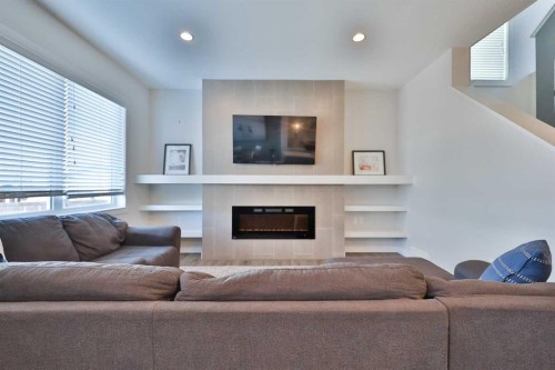 283 Northlander Bend West, Lethbridge, AB - Indoor Photo Showing Living Room With Fireplace