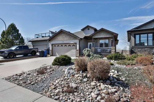 605 Sunridge Crescent West, Lethbridge, AB - Outdoor With Deck Patio Veranda With Facade