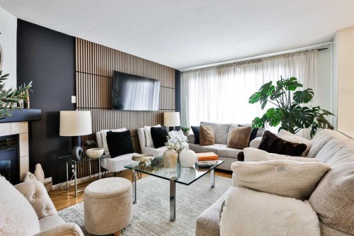 33 Chilcotin Road, Lethbridge, AB - Indoor Photo Showing Living Room With Fireplace