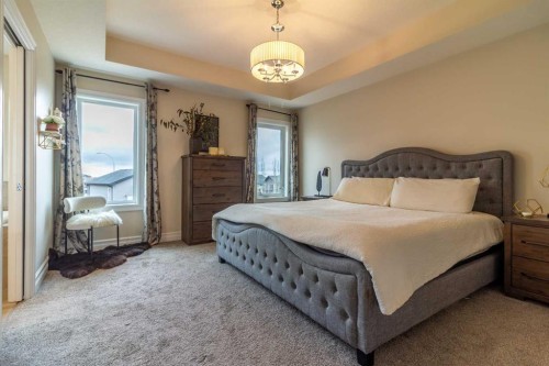 597 Aquitania Boulevard West, Lethbridge, AB - Indoor Photo Showing Bedroom