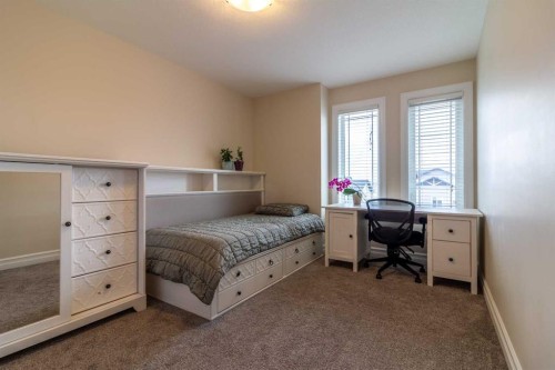597 Aquitania Boulevard West, Lethbridge, AB - Indoor Photo Showing Bedroom