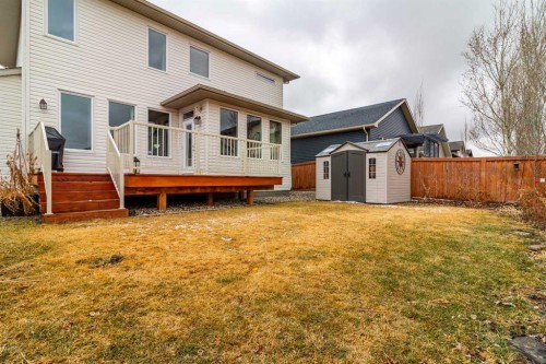 597 Aquitania Boulevard West, Lethbridge, AB - Outdoor With Deck Patio Veranda With Exterior