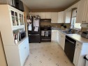5413 38 Avenue, Taber, AB  - Indoor Photo Showing Kitchen With Double Sink 