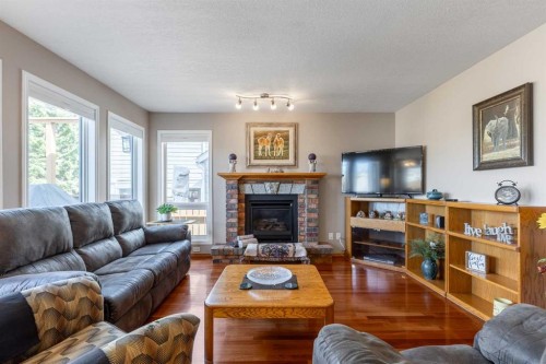 229 Coachwood Point West, Lethbridge, AB - Indoor Photo Showing Living Room With Fireplace